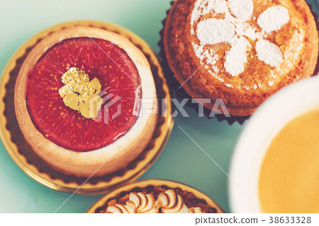 Handcrafted fruit tarts and pastries with coffee Handcrafted fruit tarts and pastries with coffee 38633328
