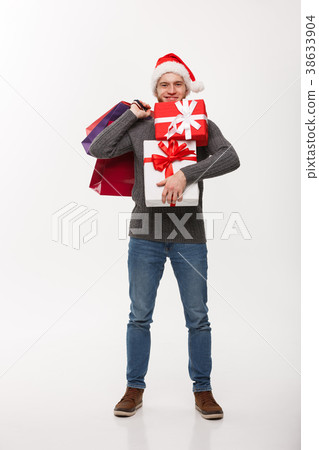 Christmas Concept - attractive young caucasian man Christmas Concept - attractive young caucasian man 38633904