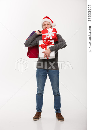 Christmas Concept - young handsome man with beard 38633905
