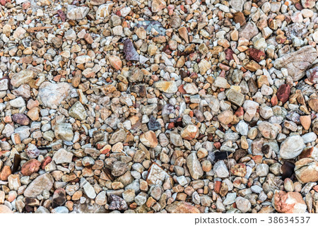 Sand and stone on the beach Sand and stone on the beach 38634537