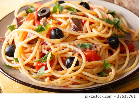 Pasta Alla Puttanesca with anchovies Pasta Alla Puttanesca with anchovies 38635761