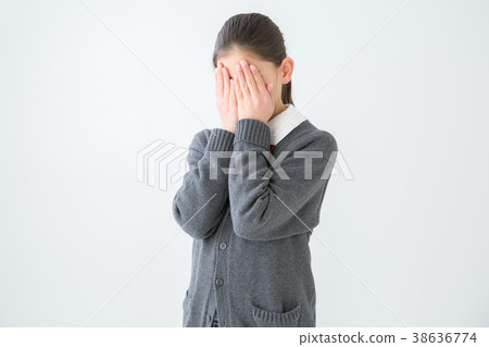 Female student hiding her face 38636774