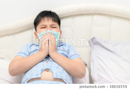 obese fat boy sneeze with face mask protection obese fat boy sneeze with face mask protection 38638559