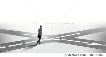 Young businessman at crossroads in uncertainty 38639382