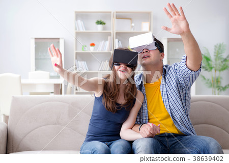 Young family playing games with virtual reality Young family playing games with virtual reality 38639402