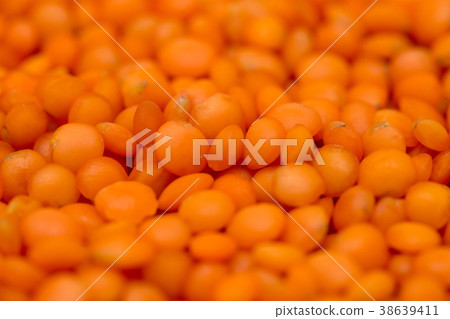 Red lentils as background. macro Red lentils as background. macro 38639411