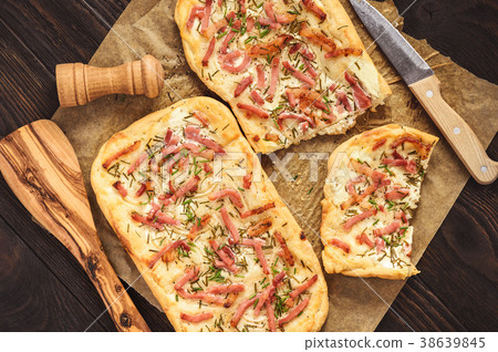 Tarte flambee, traditional alsatian pizza. 38639845