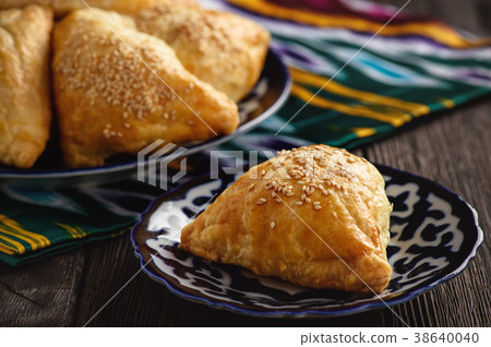 Puff pastries with meat (samosa). Puff pastries with meat (samosa). 38640040