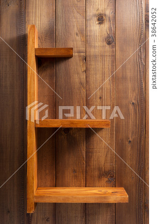 shelf at wooden background wall shelf at wooden background wall 38642052