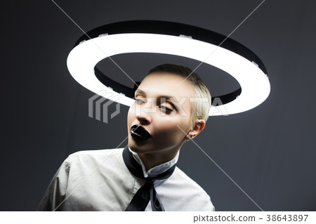 Stylish fashion portrait of a blonde with a 38643897