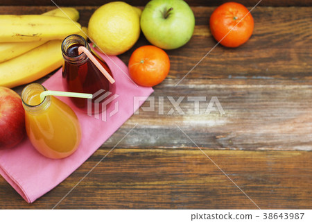 Fresh organic fruit Juice in glass Bottle on 38643987