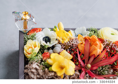 Luxury perfume bottle with flowers in the gift box Luxury perfume bottle with flowers in the gift box 38644884