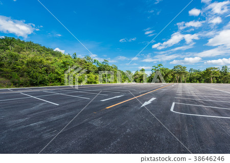 Empty space parking lot outdoor in public park. Empty space parking lot outdoor in public park. 38646246