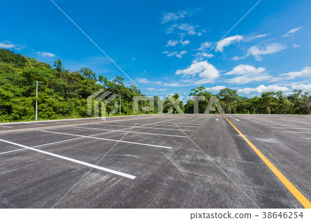 Empty space parking lot outdoor in public park. Empty space parking lot outdoor in public park. 38646254