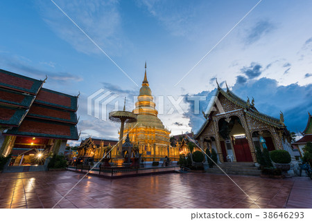 Wat Phra That Hariphunchai with Twilight time  38646293