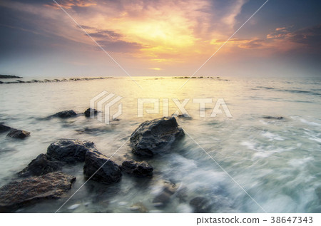 tropical beach over magical sunlight color 38647343