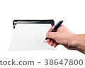Signature on a piece of paper 38647800