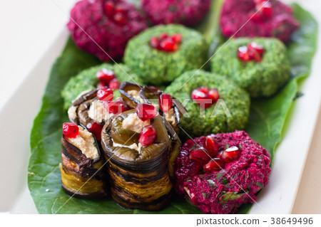 Rolls of eggplant with a filling of walnuts 38649496