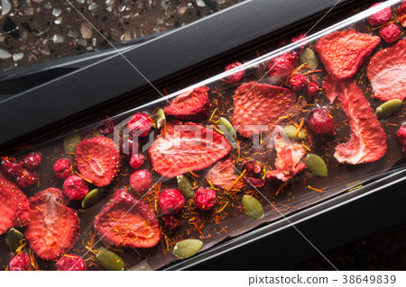 Handmade chocolate with dried strawberries 38649839