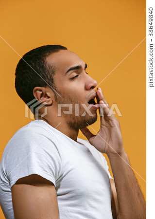 Bored Afro-American man want to sleep against Bored Afro-American man want to sleep against 38649840