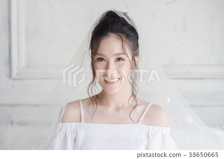 Happy Healthy woman smiling on bed Happy Healthy woman smiling on bed 38650665