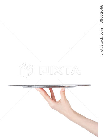 Female hand holds stainless steel catering tray Female hand holds stainless steel catering tray 38652066