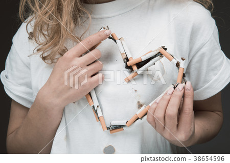 Woman making choice in favor of smoking Woman making choice in favor of smoking 38654596