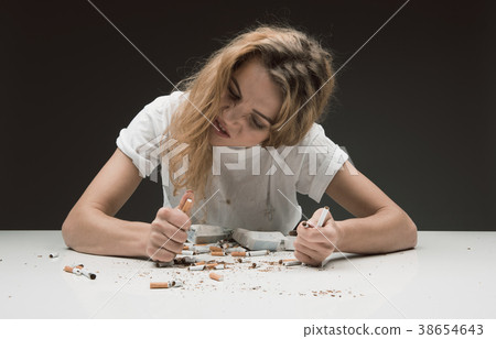 Decisive woman getting rid of harmful habit 38654643