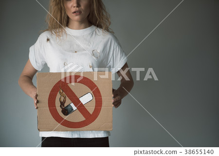 Serious woman saying no to smoking Serious woman saying no to smoking 38655140