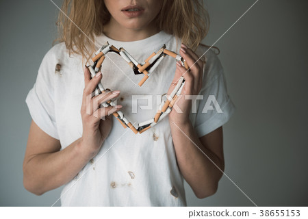 Tranquil young girl loving smoking Tranquil young girl loving smoking 38655153