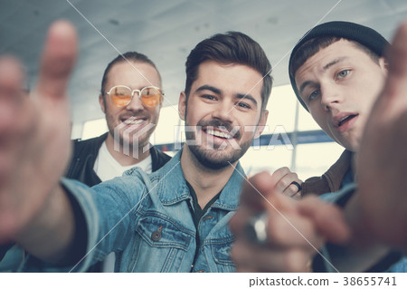 Glad comrades doing photo in arms Glad comrades doing photo in arms 38655741