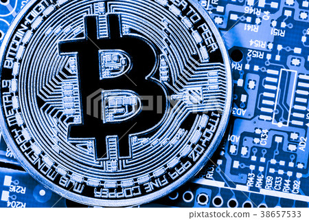 close up of Golden Bitcoin money on computer. 38657533