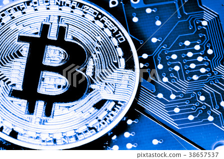 close up of Golden Bitcoin money on computer. 38657537