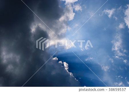 Clouds gathered in the sky under the sun. Clouds gathered in the sky under the sun. 38659537