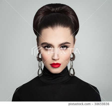 Stylish Young Woman with Hair Bun Hairdo Stylish Young Woman with Hair Bun Hairdo 38659836