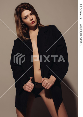 Cool beautiful woman in black leather jacket Cool beautiful woman in black leather jacket 38660944