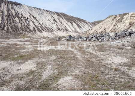 Beautiful view of limestone quarry. 38661605