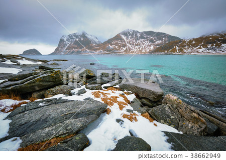 Rocky coast of fjord in Norway 38662949