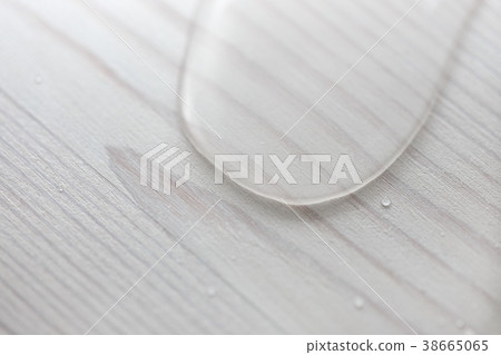 Water drops on white wooden surface made from Water drops on white wooden surface made from 38665065