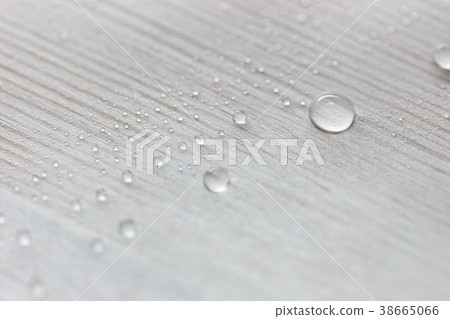 Water drops on white wooden surface made from Water drops on white wooden surface made from 38665066