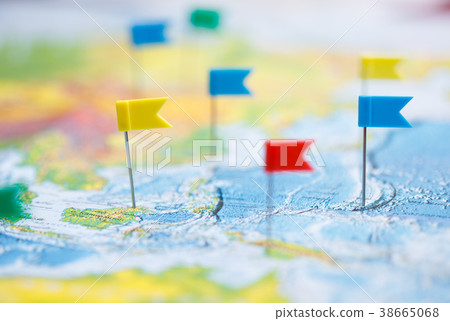 Macro photo with flag pushpins and world map Macro photo with flag pushpins and world map 38665068