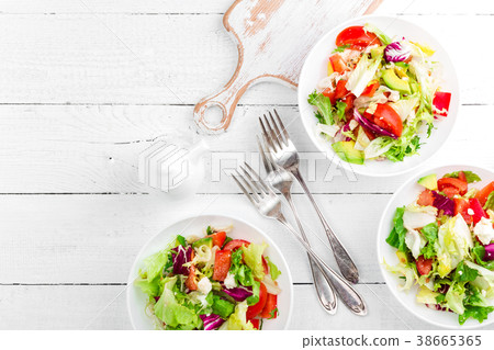 Healthy vegetable salad with fresh greens Healthy vegetable salad with fresh greens 38665365