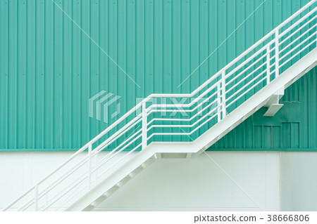 Fire escape ladder with steel staircase on wall Fire escape ladder with steel staircase on wall 38666806