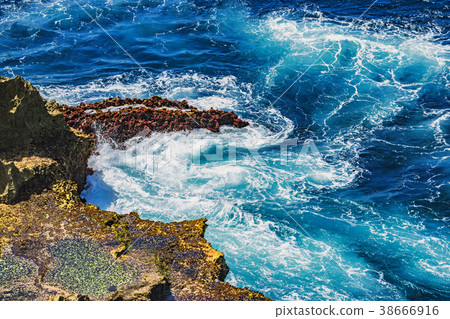 Waves struck on the rocks on the cliff Waves struck on the rocks on the cliff 38666916