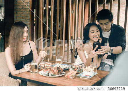 Asian single woman envious with love couple 38667219