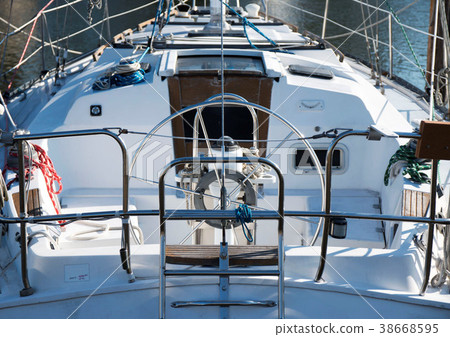 The back of a sailboat that is docked 38668595