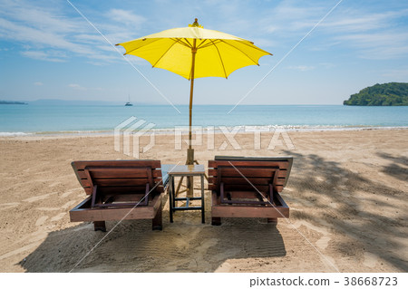 Beach Chairs and Umbrella in Phuket, Thailand. 38668723