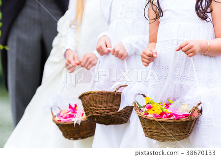 Wedding bridesmaids children with flower basket 38670133