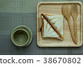 Sandwiches like on a wooden tray.. 38670802