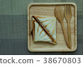 Sandwiches like on a wooden tray.. 38670803